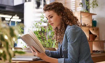 Buy stock photo University, reading and woman with book in cafeteria for knowledge with literature in morning. Diner, student and female person studying novel or story for assignment, test or exam in restaurant.
