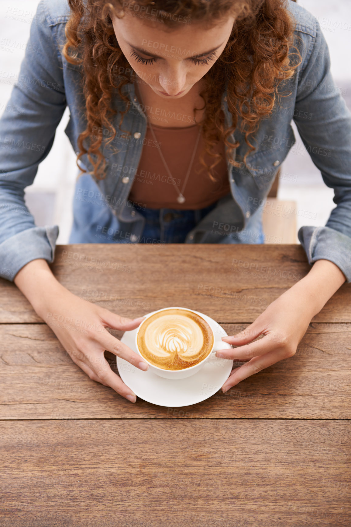 Buy stock photo Woman, top view and coffee at a cafe, restaurant and diner with tea cup, latte and espresso for drinking, break and relaxation. Female adult, hot beverage and table at canteen, bistro or cafeteria