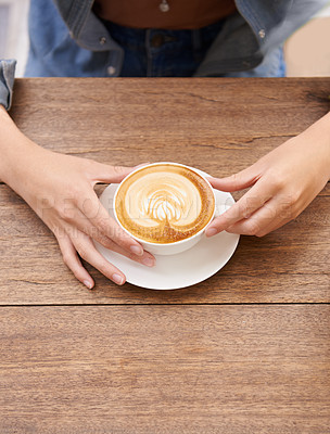 Buy stock photo Person hands, coffee cup and foam in cafe espresso, caffeine and latte art on wooden table. Cappuccino mug, hot milk and cream for taste with drink, fresh and warm beverage in restaurant for break