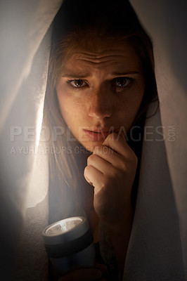 Buy stock photo Woman, flashlight and portrait with blanket for mental health, horror or anxiety. Young person and scared or sad with depression, ocd or horror for financial crisis, stress and disappointment 