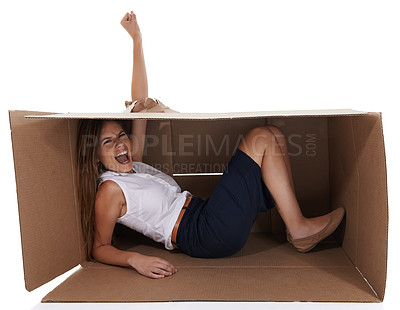 Buy stock photo Portrait, winner and woman breaking box in studio isolated on white background for delivery success. Goals, target and victory with fist of excited young person cheering or shouting for distribution