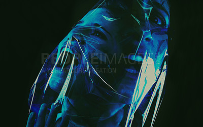 Buy stock photo Scary, face and woman with plastic or bag in horror, drama or death in dark background of studio. Suffocating, murder and girl with fear from crime, victim and trapped in trash, garbage or pollution