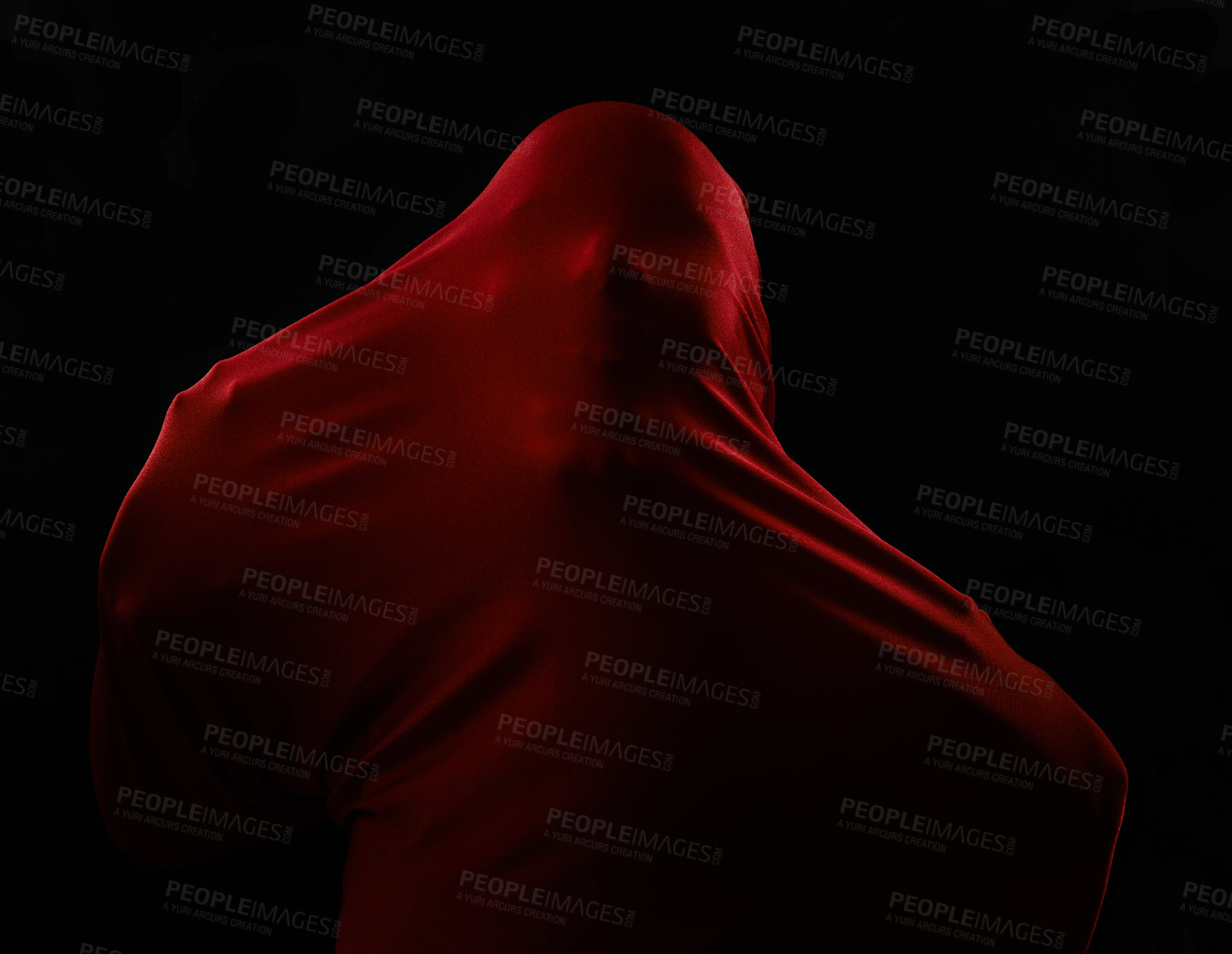 Buy stock photo Scary, horror and person trapped in fabric for art and drama on black background in studio. Suffocating, fear and model stuck in cloth as demon, monster or ghost with terror for creative aesthetic
