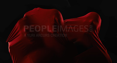 Buy stock photo Scary, people and trapped in fabric for horror, art and drama on black background in studio. Suffocating, fear and stuck in cloth as demon, monster or ghost scream with terror for creative aesthetic