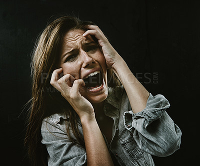 Buy stock photo Portrait, mental health and horror with woman screaming in studio on black background for reaction to fear. Face, anxiety and stress with scared young person in dark for drama, nightmare or terror