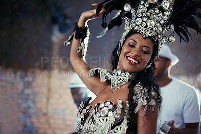 Buy stock photo Shot of a beautiful samba dancer and her band