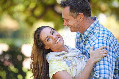 Buy stock photo Couple, portrait and hug with care in garden together, bonding and romance for relationship with commitment. Man, woman and affection for dating with love, happy and spouse for comfort in nature