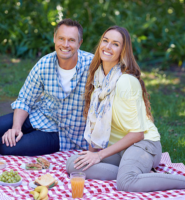 Buy stock photo Portrait, picnic and couple with love, smile and happiness with romance and Valentines day with marriage. Outdoor, man or woman on the ground, relationship or anniversary with celebration or vacation