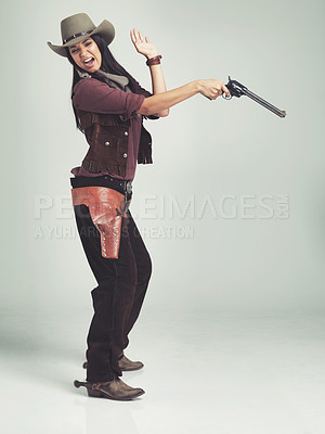 Buy stock photo Cowgirl, woman and shooting gun, pistol or weapon in studio with costume isolated on white background mockup. Western, criminal and female person with revolver, scared or screaming in fear in Texas