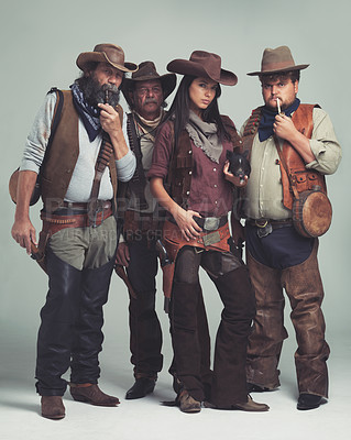 Buy stock photo Vintage, fashion and portrait of cowboy in studio with clothes for halloween, character and costume. Man, woman and group of people with confidence for western, band and criminal lifestyle together