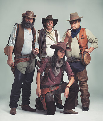 Buy stock photo Vintage, western and portrait of cowboy in studio with fashion for halloween, costume and character. Man, woman and group of people with confidence for criminal, band and outlaw lifestyle together