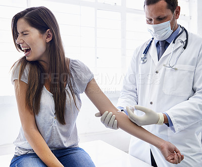 Buy stock photo Doctor, woman and arm injection or scared scream in hospital or anxiety feaR or medicine treatment, disease or diagnosis. Male person, face mask and patient with needle panic, terror or trypanophobia