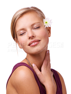 Buy stock photo Flower, beauty and face of woman on a white background for skincare, wellness and spa aesthetic. Eye closed, attractive and isolated person with floral, bloom or plant for natural cosmetics in studio