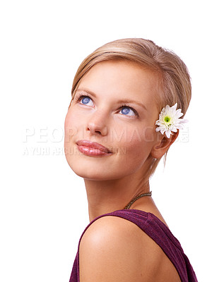 Buy stock photo Woman, closeup and face with flower isolated on white studio background for beauty, cosmetics and makeup campaign. Female person, model and smile in happiness for skin care, glamor and elegance