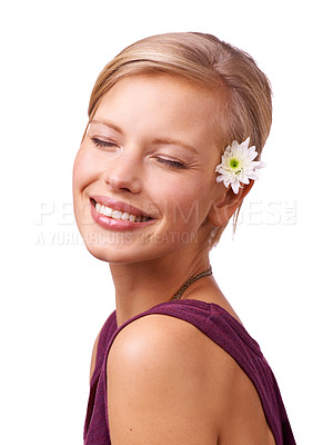 Buy stock photo Skincare, face and happy woman with beauty or flower with shine, smile and skin treatment in studio. White background, eyes closed or person isolated with natural facial cosmetics, wellness or glow