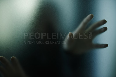 Buy stock photo Scary, mystery and person with hand on glass, window or trapped in home. Ghost, shadow and figure in horror, drama or creepy aesthetic with silhouette of spooky prisoner in house with fog on screen