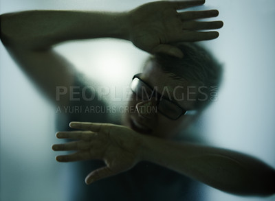 Buy stock photo Scary, mystery and man with hands on glass, window or trapped in home. Person, shadow and figure in horror, drama or creepy aesthetic with prisoner struggling to escape house with smoke on screen