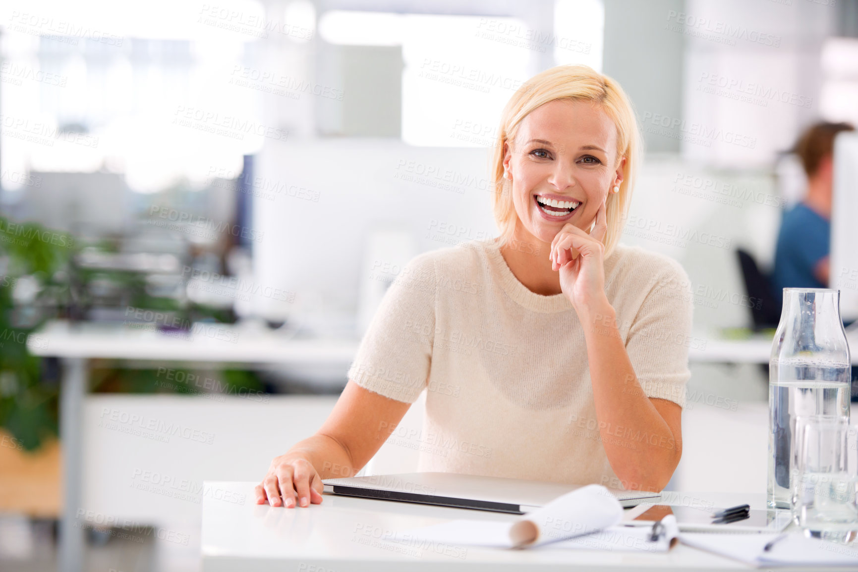 Buy stock photo Cropped shot of an attractive young businesswoman working at her office desk