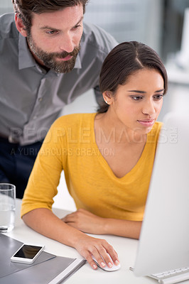 Buy stock photo Laptop, reading and manager with woman in office with research for creative project online. Career, technology and professional man helping female designer work on internet with computer in workplace