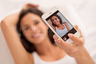 Buy stock photo Woman, selfie and phone screen in morning, bed and relax with photography on web blog. Girl, person and influencer for profile picture, click and ux for live streaming in bedroom on social network