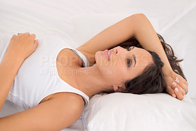 Buy stock photo A beautiful young woman enjoying a relaxed morning in bed