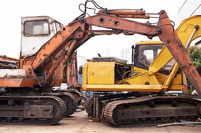 Buy stock photo Two bulldozers in a scrapyard