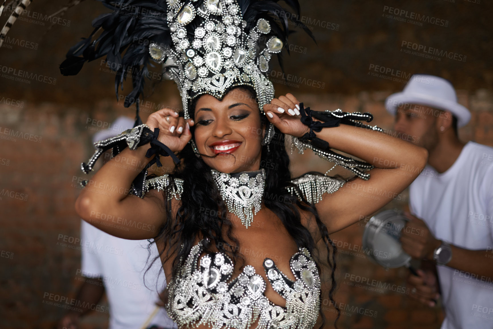 Buy stock photo Woman, happy and samba performance at night for celebration in Rio de janeiro for carnival season. Female person, costume and feathers for culture and life, creativity and confidence at festival