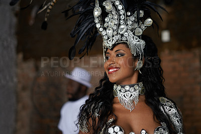 Buy stock photo Happy woman, samba dancer and tradition with costume for performance at carnival or festival. Face of female person or exotic performer with smile and cultural fashion for dancing or concert in Rio