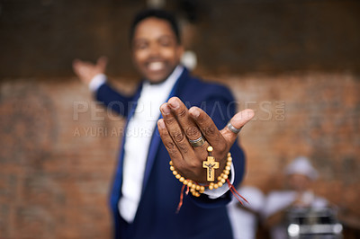 Buy stock photo Black man, christianity and hands with cross at church for holy welcome, faith or hope of spiritual leader. Closeup of African male person, priest or preacher with rosary beads for worship of god
