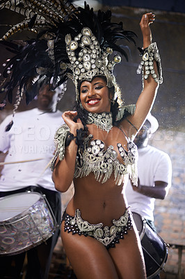 Buy stock photo Carnival, dance and woman for performance in Brazil, dancer with gemstone outfit and feather head gear outdoor. Music, samba and happiness for event and culture with festival entertainment and talent