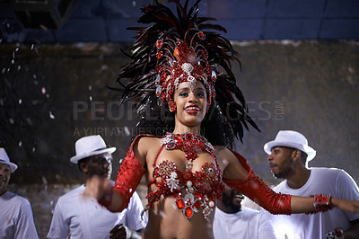 Buy stock photo Woman, dance and samba for music festival, carnival or street performance with costume at night. Excited dancer with drummer or band for event, celebration and culture with confetti in Rio de Janeiro