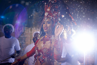 Buy stock photo Samba, woman and dancer with band at festival in rio de janeiro for brazilian carnival with feather costume or smile. Person, face or night with dancing, fashion or light for culture or outdoor event