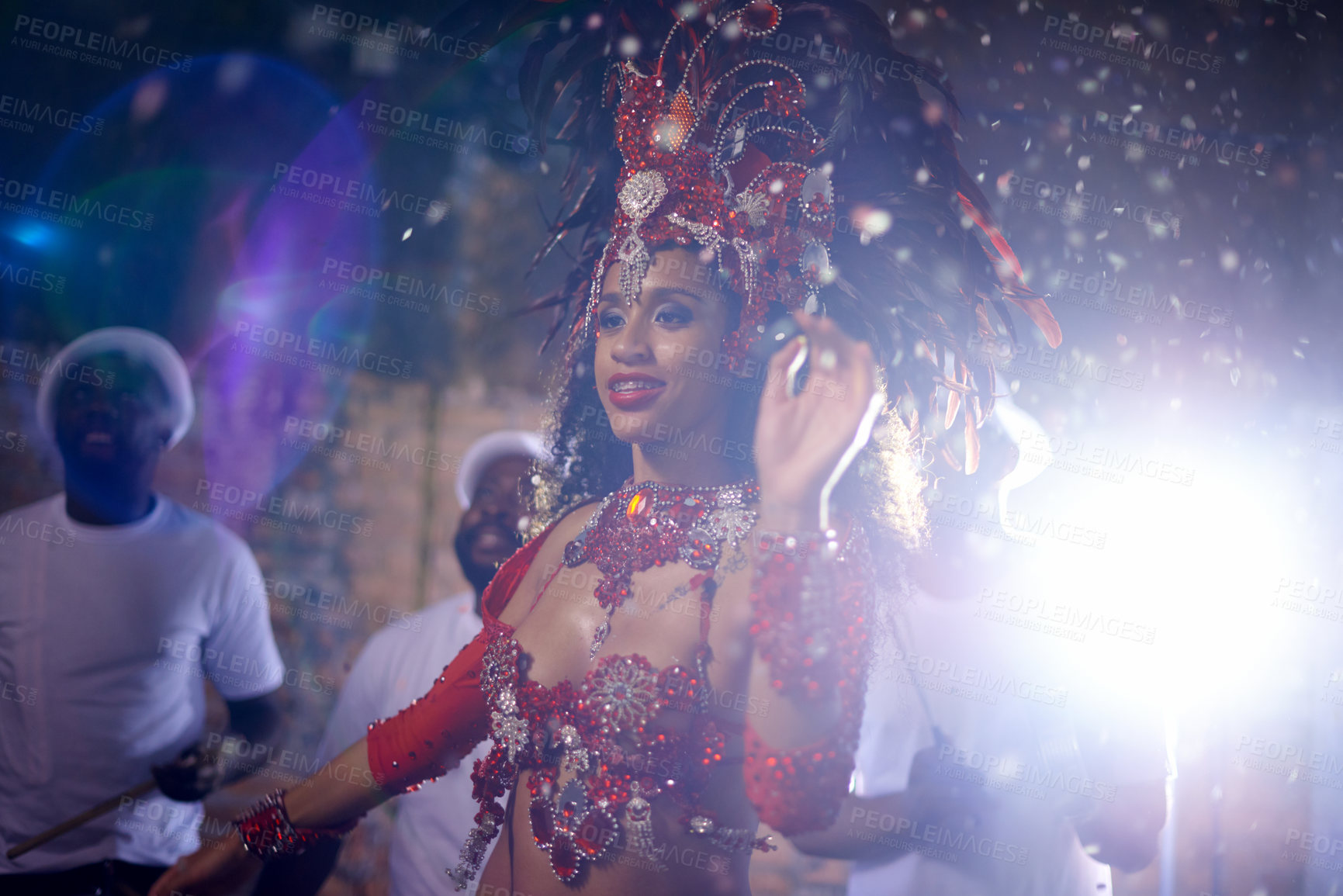 Buy stock photo Samba, woman and dancer with band at festival in rio de janeiro for brazilian carnival with feather costume or smile. Person, face or night with dancing, fashion or light for culture or outdoor event