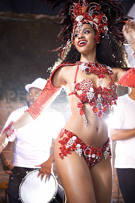 Buy stock photo Black woman, dancing and samba with band at night for carnival season celebration in Rio de janeiro with sequins costumes. Female person, happy and fun at festival with unique fashion for culture