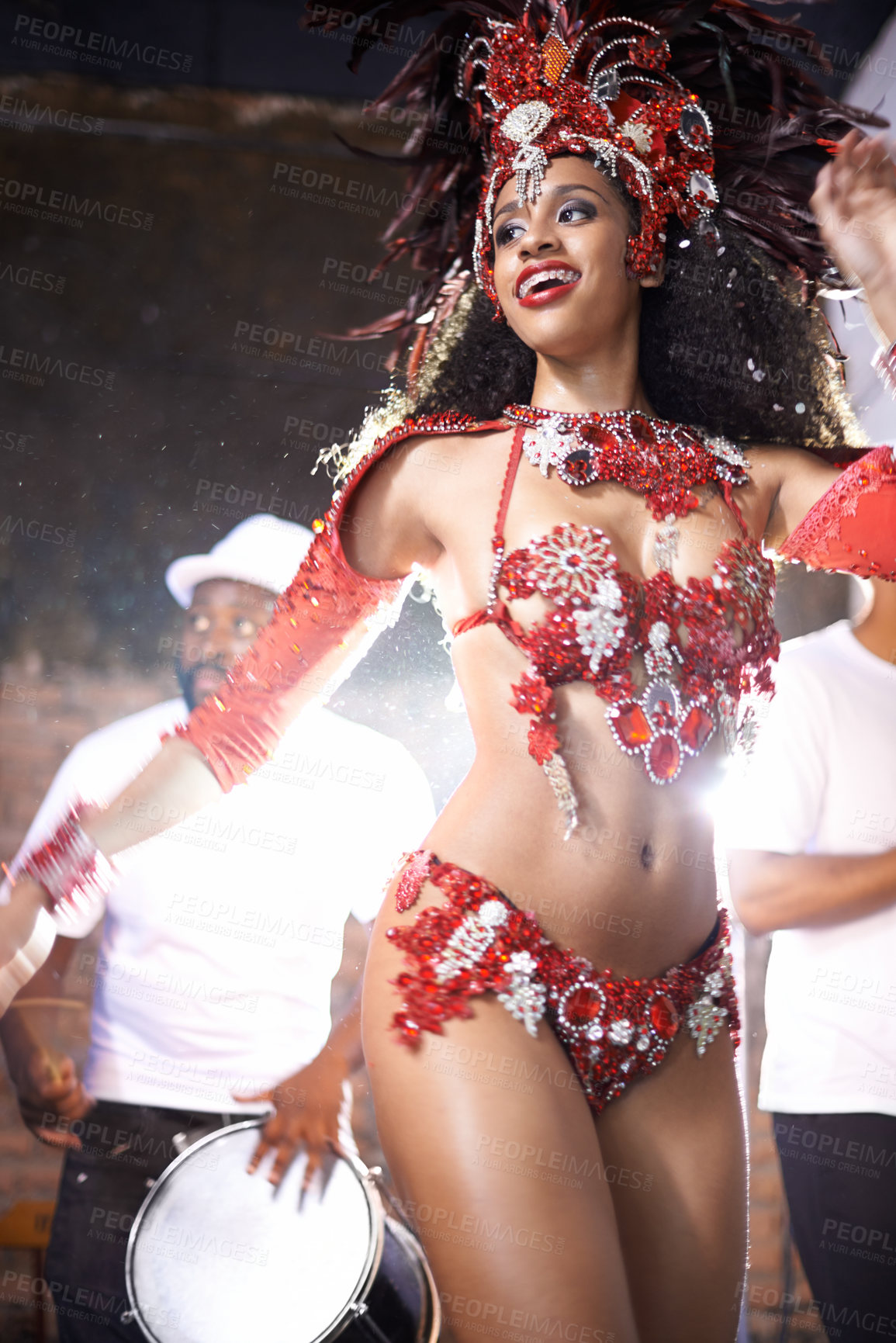 Buy stock photo Black woman, dancing and samba with band at night for carnival season celebration in Rio de janeiro with sequins costumes. Female person, happy and fun at festival with unique fashion for culture