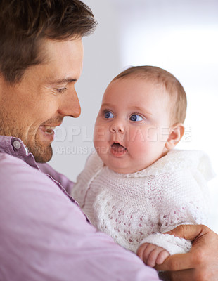 Buy stock photo Father, baby and happy face in a home with a calm, relax and sweet infant in living room. Youth, child and house with toddler at morning with love, support and bonding together with fun and comfort
