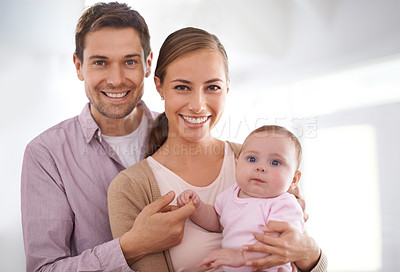 Buy stock photo Portrait, happy family and baby with parents in home for bonding, love and smile together. Face, mother and father with infant in living room for relationship, connection and care of child in house