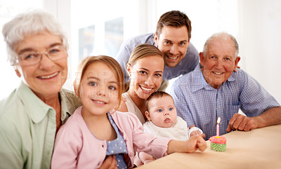 Buy stock photo Family, portrait and birthday party, cupcake and candle to celebrate and happy people at home. Parents, grandparents and children with cake or dessert for anniversary and generations with smile
