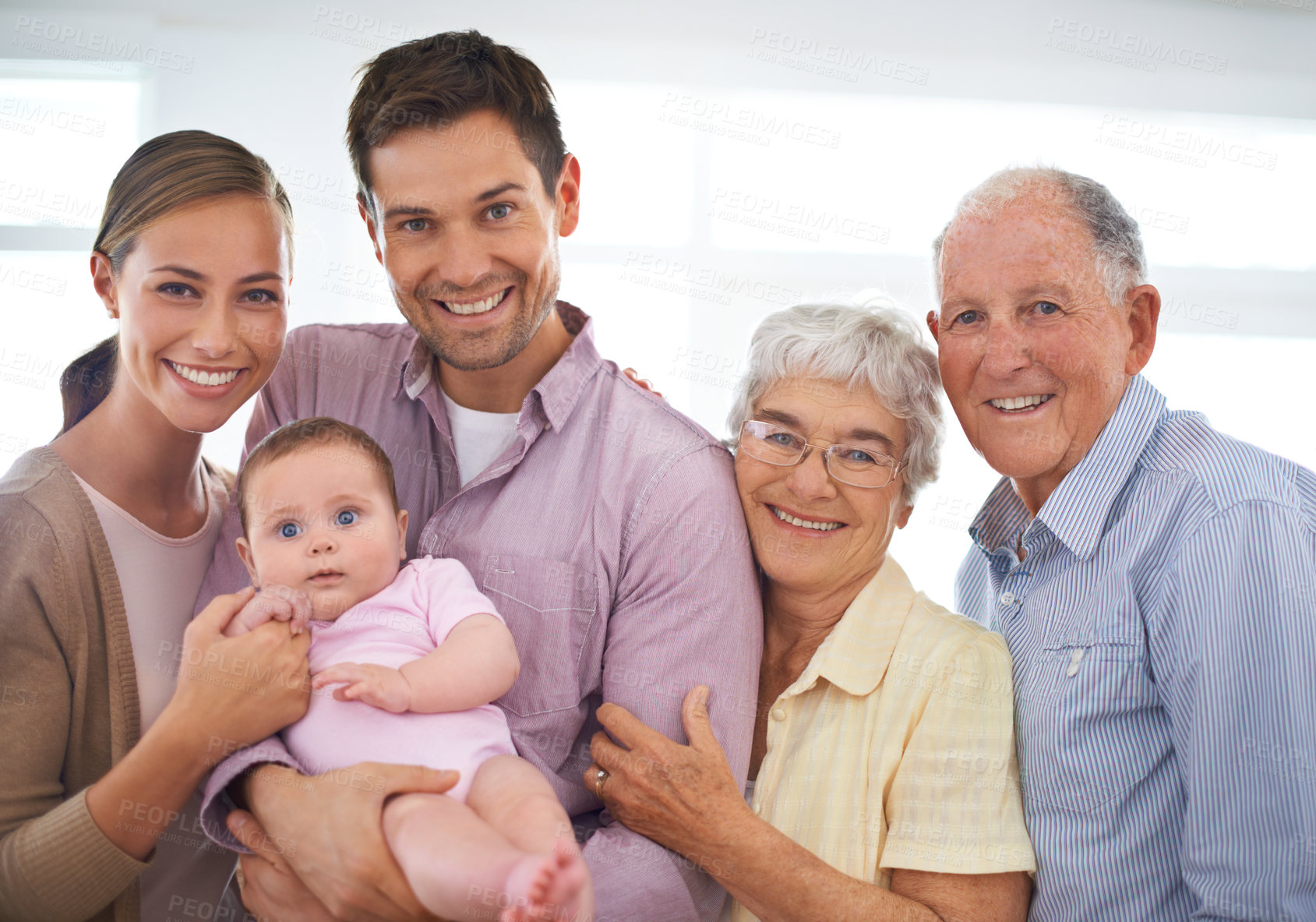 Buy stock photo Portrait, happy big family and baby in home for bonding, love and infant together with parents. Face, grandparents and child with mother, father and kid in living room with a smile for connection