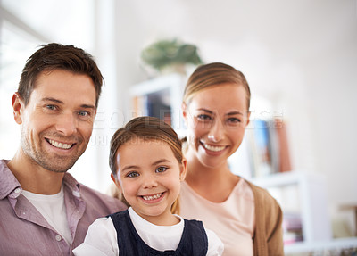 Buy stock photo Portrait, family and happy girl with parents in home for bonding, love and relax together. Face, mother and father with kid in living room for relationship and care of child for connection in house