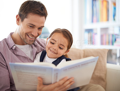 Buy stock photo A father reading a story