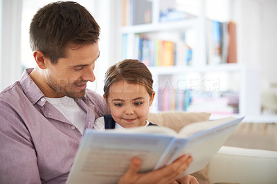 Buy stock photo Father, child and reading book for storytelling, happy and bonding at home and knowledge or education. Man, young girl and story time for family and learning with love and care together in lounge