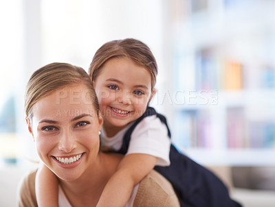 Buy stock photo Mother, kid and piggyback in portrait with games in family home, love and bonding with smile while playing. Playful woman, young girl and happy in living room with fun time together for childhood