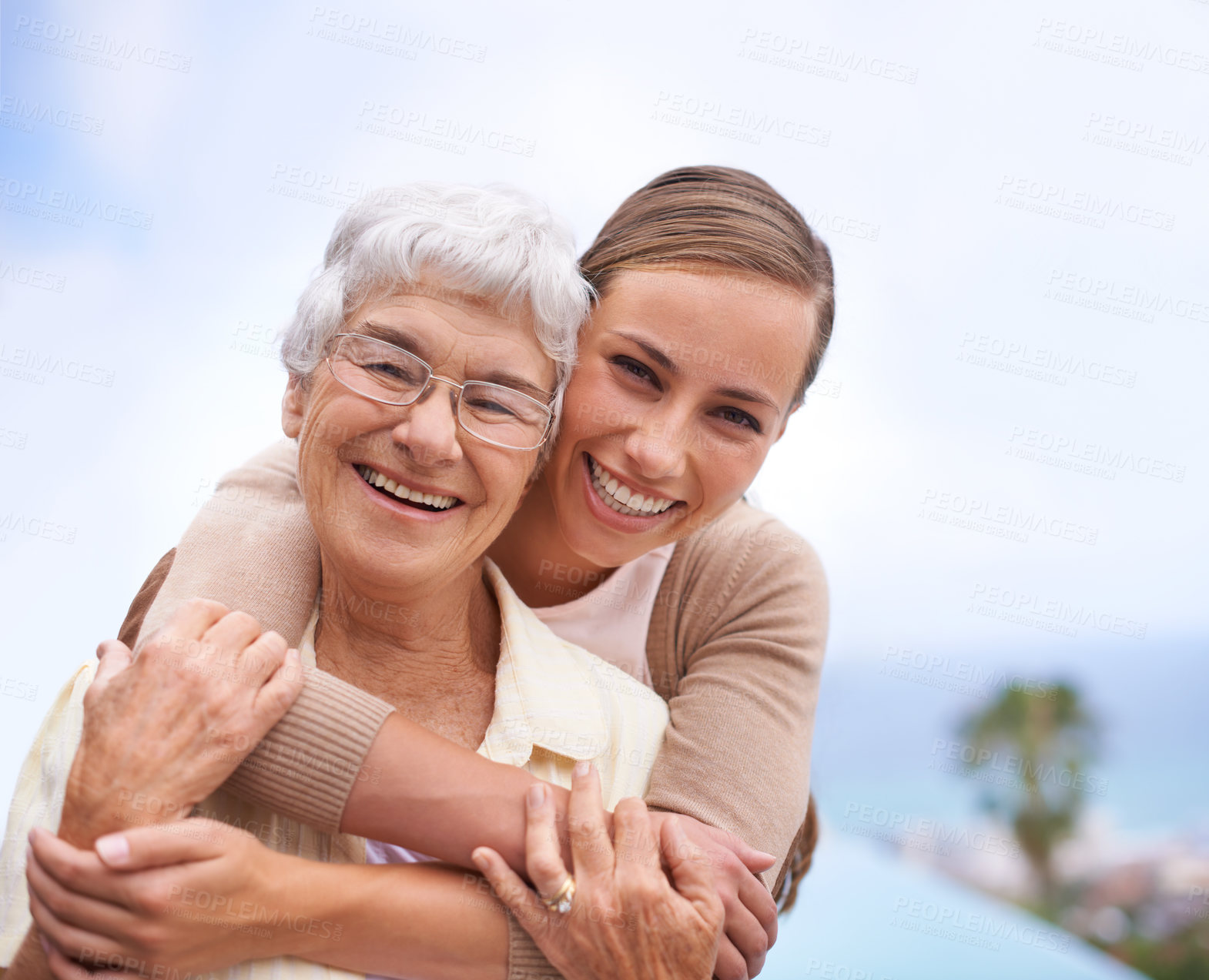 Buy stock photo Cropped shot of a young woman and her mother bonding