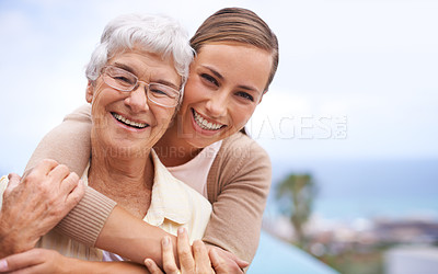 Buy stock photo Happy women, mother and daughter hug in portrait smile, excited and show affection in mockup space. Lovely family, mom and girl on vacation enjoy, retirement and embrace with happiness and joy