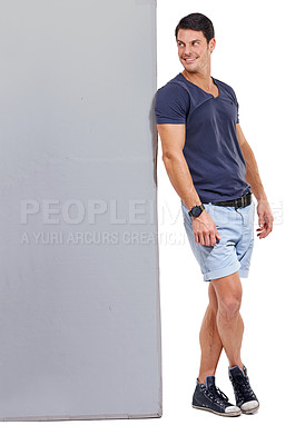 Buy stock photo Male person, studio and advertising with board, casual outfit and smile for sales and marketing. Man, billboard and branding for mockup space, white background and confident advertisement brand