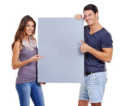 Buy stock photo Happy couple, portrait and thumbs up with empty poster on studio background by mockup space for presenting, marketing and advertising. People, models or partners together with blank billboard