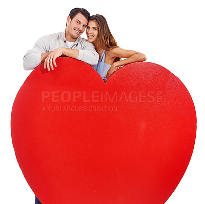 Buy stock photo Couple, smile and heart paper in studio for love, romance and portrait with care and mockup on a white background. Young woman and man with red poster, shape and marketing space for valentines day