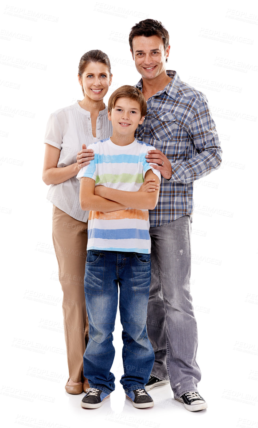 Buy stock photo Studio portrait of a mother and father standing with their son