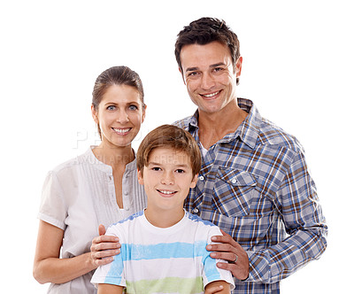 Buy stock photo Mother, father and son in studio portrait with smile, care and embrace with love by white background. People, family and parents with boy, child and happy together with connection in trendy fashion